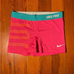 Pink Nike Pro Dri-Fit shorts